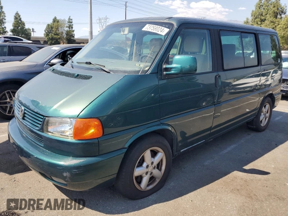 2003 Volkswagen EuroVan с VIN WV2KB47043H001319, выставлен на аукционе Copart как лот 73758024 с пробегом 88 497 миль миль и Чистый • Clean title. История ставок и продаж доступна на DreamBid. Изображение 1.