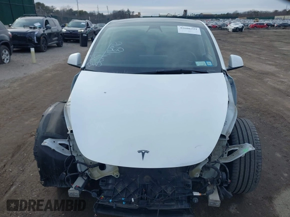 2021 Tesla Model Y Performance with VIN 5YJYGDEF1MF262930, listed as a IAAI auction lot 41606321 with 28,882 mi miles and . Bid and sale history available at DreamBid. Image 6.