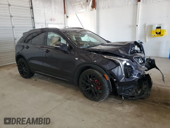 2023 Cadillac XT4 AWD Sport z VIN 1GYFZFR41PF103650, wystawiony jako Copart lot #59321355 z przebiegiem 27 092 mil mil oraz Szkoda całkowita • Salvage title. Historia ofert i sprzedaży dostępna na DreamBid. Obrazek 4.