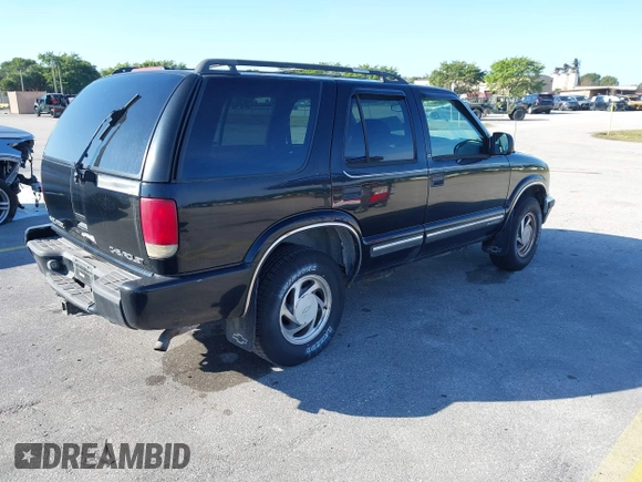2000 Chevrolet Blazer LT with VIN 1GNDT13W5Y2244197, listed as a IAAI auction lot 41440176 with 133,797 mi miles and . Bid and sale history available at DreamBid. Image 4.