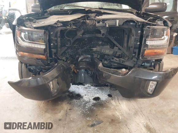 2016 Chevrolet Silverado 1500 LT with VIN 3GCUKRECXGG216804, listed as a IAAI auction lot 41825811 with 127,217 mi miles and . Bid and sale history available at DreamBid. Image 6.