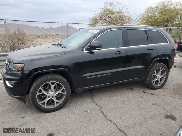 2018 Jeep Grand Cherokee Limited with VIN 1C4RJFBT9JC143771, listed as a Copart auction lot 85987184 with 55,549 mi miles and Salvage Title. Bid and sale history available at carsss.com. Image 1.