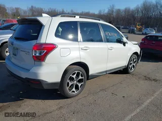 2016 Subaru Forester 2.0XT Premium with VIN JF2SJGDC3GH527384, listed as a IAAI auction lot 41763974 with 107,411 mi miles. Bid and sale history available at carsss.com. Image 4.