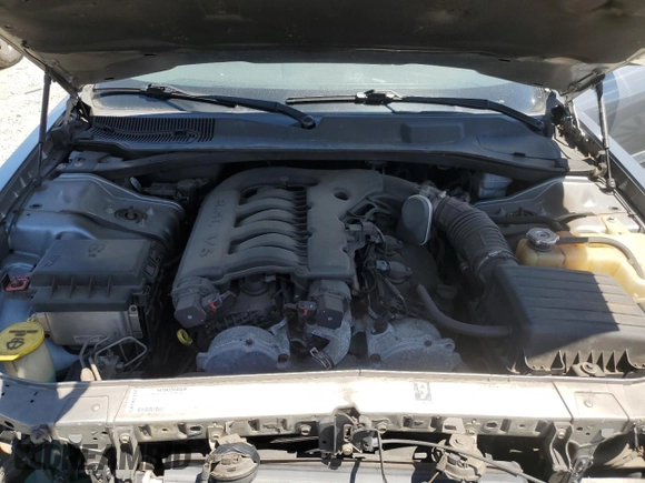 2007 Chrysler 300 Touring z VIN 2C3KA53G07H833643, wystawiony jako Copart lot #56048745 z przebiegiem 191 871 mil mil oraz Szkoda całkowita • Salvage title. Historia ofert i sprzedaży dostępna na DreamBid. Obrazek 11.