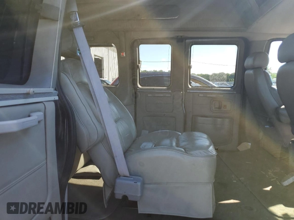 2004 Chevrolet Express Passenger z VIN 1GBFG15T841212230, wystawiony jako Copart lot #61109634 z przebiegiem 154 493 mil mil oraz Szkoda całkowita • Salvage title. Historia ofert i sprzedaży dostępna na DreamBid. Obrazek 11.