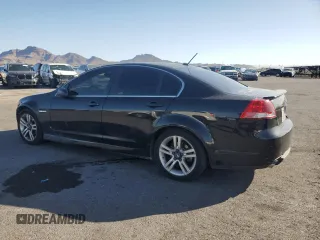 2009 Pontiac G8 z VIN 6G2ER57769L215137, wystawiony jako Copart lot #52262665 z przebiegiem 174 574 mil mil oraz Czysty tytuł • Clean title. Historia ofert i sprzedaży dostępna na DreamBid. Obrazek 2.