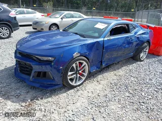 2021 Chevrolet Camaro 1LT with VIN 1G1FA1RS0M0101720, listed as a IAAI auction lot 41734409 with 44,637 mi miles. Bid and sale history available at carsss.com. Image 2.