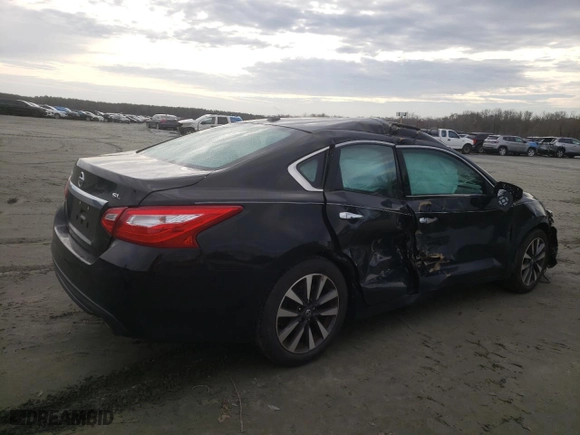 2017 Nissan Altima 2.5 SL with VIN 1N4AL3AP0HC110071, listed as a Copart auction lot 85013254 with 74,551 mi miles and Salvage Title. Bid and sale history available at carsss.com. Image 3.