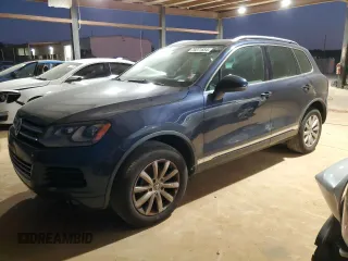2012 Volkswagen Touareg Exec with VIN WVGEF9BP8CD007760, listed as a Copart auction lot 79271654 with 164,287 mi miles and Clean Title. Bid and sale history available at DreamBid. Image 1.