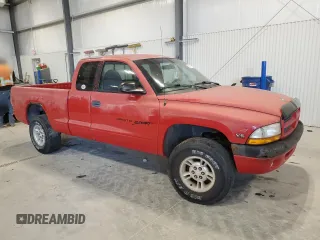 1999 Dodge Dakota SLT with VIN 1B7GG22X1XS295947, listed as a Copart auction lot 82611714 with Not Provided miles and Salvage Title. Bid and sale history available at carsss.com. Image 4.