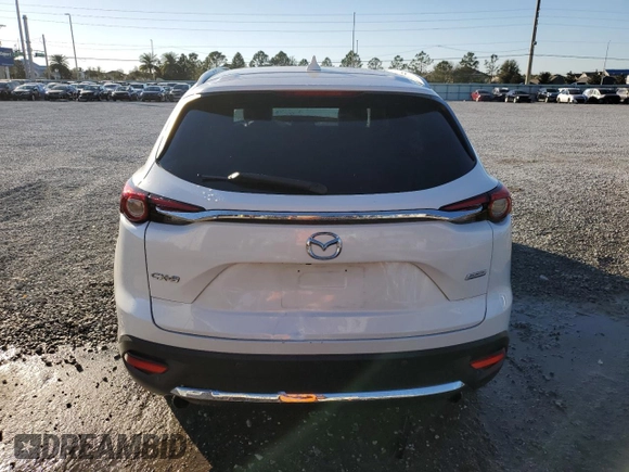 2017 Mazda CX-9 Grand Touring z VIN JM3TCADYXH0127867, wystawiony jako Copart lot #82352204 z przebiegiem 129 349 mil mil oraz Szkoda całkowita • Salvage title. Historia ofert i sprzedaży dostępna na DreamBid. Obrazek 6.