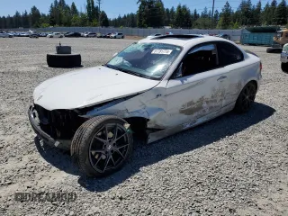 2012 BMW 1 Series 128i with VIN WBAUP9C53CVS94278, listed as a Copart auction lot 57781774 with 52,347 mi miles and Salvage title. Bid and sale history available at DreamBid. Image 1.