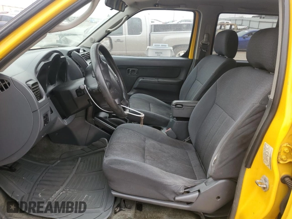 2002 Nissan Frontier XE with VIN 1N6ED29X72C389062, listed as a Copart auction lot 50712195 with 212,403 mi miles and Salvage title. Bid and sale history available at DreamBid. Image 7.