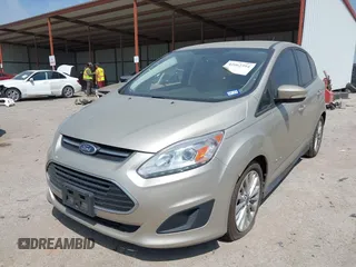 2018 Ford C-Max SE with VIN 1FADP5AU8JL102227, listed as a IAAI auction lot 42062394 with 122,943 mi miles. Bid and sale history available at carsss.com. Image 2.