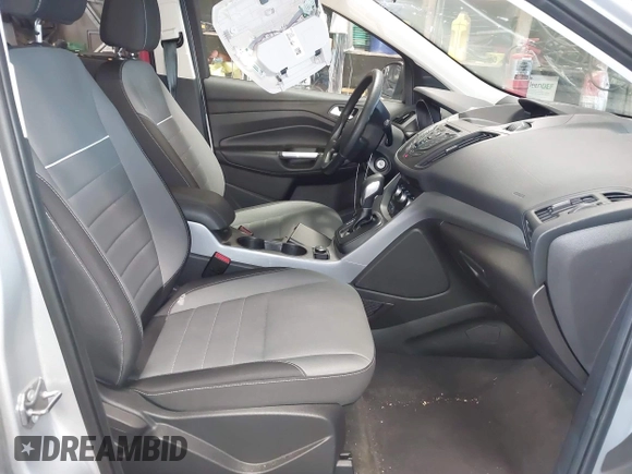 2015 Ford Escape SE with VIN 1FMCU0GX4FUC22042, listed as a IAAI auction lot 42094798 with 35,407 mi miles and . Bid and sale history available at DreamBid. Image 5.