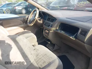 2002 Toyota Sienna LE with VIN 4T3ZF13C42U469088, listed as a IAAI auction lot 42184081 with Not provided miles and . Bid and sale history available at DreamBid. Image 5.