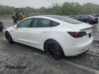 2020 Tesla Model 3 Performance z VIN 5YJ3E1EC9LF784594, wystawiony jako Copart lot #56179955 z przebiegiem 97 419 mil mil oraz Szkoda całkowita • Salvage title. Historia ofert i sprzedaży dostępna na DreamBid. Obrazek 2.
