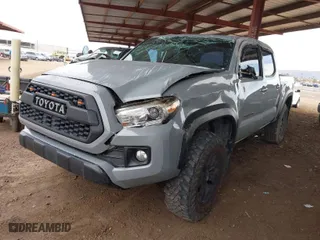 2019 Toyota Tacoma 4WD SR with VIN 3TMCZ5ANXKM225066, listed as a IAAI auction lot 41825265 with 75,908 mi miles. Bid and sale history available at carsss.com. Image 2.