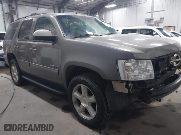 2011 Chevrolet Tahoe LT with VIN 1GNSKBE03BR268246, listed as a IAAI auction lot 41434862 with 250,991 mi miles and . Bid and sale history available at DreamBid. Image 1.