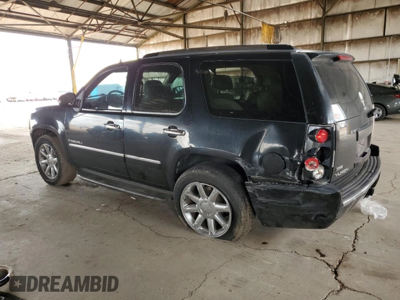2009 GMC Yukon Denali z VIN 1GKFK03269R144974, wystawiony jako Copart lot #49354815 z przebiegiem 141 569 mil mil oraz Szkoda całkowita • Salvage title. Historia ofert i sprzedaży dostępna na DreamBid. Obrazek 2.