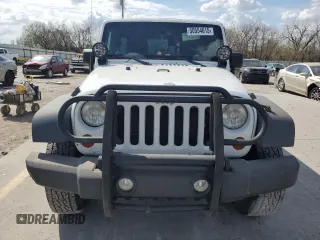 2013 Jeep Wrangler Unlimited Sport z VIN 1C4BJWDG0DL690966, wystawiony jako Copart lot #50554615 z przebiegiem 101 383 mil mil oraz Szkoda całkowita • Salvage title. Historia ofert i sprzedaży dostępna na DreamBid. Obrazek 5.