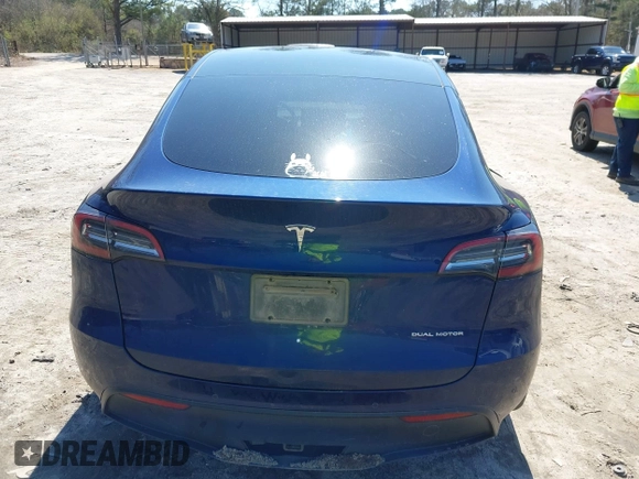 2021 Tesla Model Y Long Range with VIN 5YJYGAEE1MF207948, listed as a IAAI auction lot 41779570 with 100,859 mi miles. Bid and sale history available at carsss.com. Image 16.