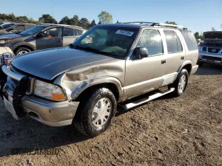 2000 GMC Jimmy SLE Convenience with VIN 1GKDT13WXY2248355, listed as a Copart auction lot 75437384 with 188,694 mi miles and Salvage Title. Bid and sale history available at carsss.com. Image 1.