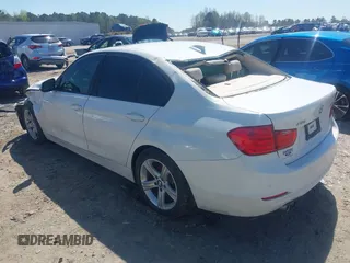 2015 BMW 3 Series 328i xDrive with VIN WBA3B5G59FNS18811, listed as a IAAI auction lot 41867015 with 147,748 mi miles. Bid and sale history available at carsss.com. Image 3.