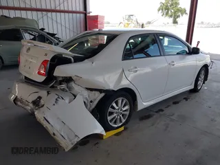2009 Toyota Corolla with VIN 1NXBU40EX9Z105775, listed as a IAAI auction lot 42054152 with 147,272 mi miles. Bid and sale history available at carsss.com. Image 4.