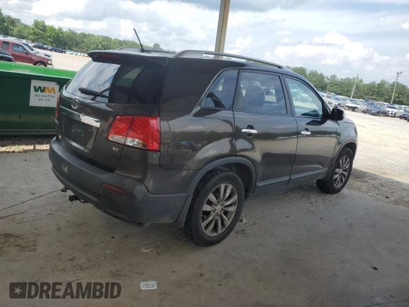 2011 Kia Sorento EX with VIN 5XYKU3A11BG134695, listed as a Copart auction lot 60104135 with 227,552 mi miles and Salvage title. Bid and sale history available at DreamBid. Image 3.