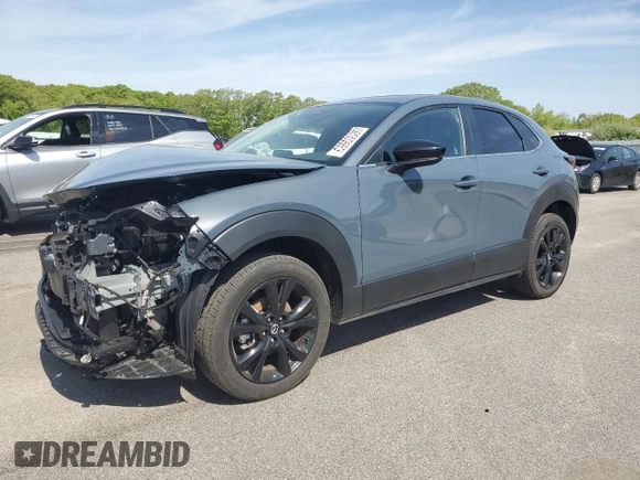 2024 Mazda CX-30 S Carbon Edition z VIN 3MVDMBCM1RM659830, wystawiony jako Copart lot #56556985 z przebiegiem 20 048 mil mil oraz Szkoda całkowita • Salvage title. Historia ofert i sprzedaży dostępna na DreamBid. Obrazek 1.