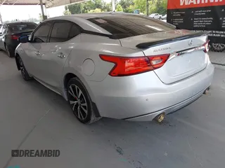 2018 Nissan Maxima SL with VIN 1N4AA6AP2JC385180, listed as a IAAI auction lot 42340264 with 115,736 mi miles and . Bid and sale history available at DreamBid. Image 3.