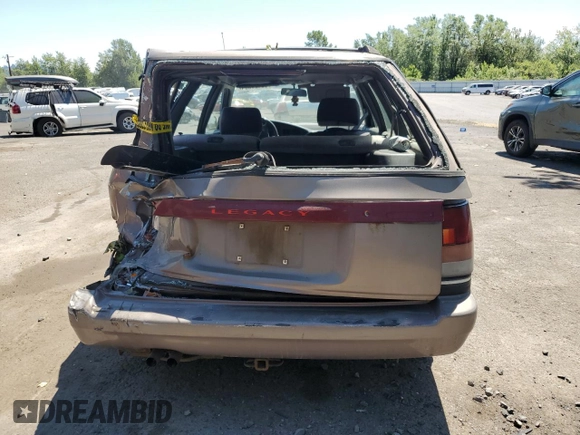 1993 Subaru Legacy L with VIN 4S3BJ6339P6948161, listed as a Copart auction lot 63123584 with 329,619 mi miles and Salvage Title. Bid and sale history available at DreamBid. Image 6.