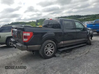 2023 Ford F-150 XL with VIN 1FTEW1C83PFA84267, listed as a Copart auction lot 65042545 with 54,508 mi miles and Salvage title. Bid and sale history available at DreamBid. Image 3.