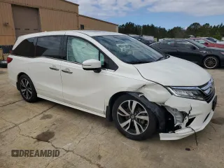 2019 Honda Odyssey Elite with VIN 5FNRL6H99KB013578, listed as a Copart auction lot 49246685 with 54,025 mi miles and Salvage title. Bid and sale history available at DreamBid. Image 4.