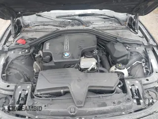 2016 BMW 3 Series 328i with VIN WBA8E9G55GNT81297, listed as a IAAI auction lot 41144563 with 98,000 mi miles. Bid and sale history available at carsss.com. Image 10.