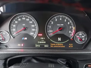 2015 BMW M4 with VIN WBS3U9C5XFJ968082, listed as a IAAI auction lot 41513593 with 57,715 mi miles. Bid and sale history available at carsss.com. Image 7.