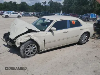 2007 Chrysler 300 Touring z VIN 2C3KA53G07H613452, wystawiony jako Copart lot #61084815 z przebiegiem Nie podano mil oraz Szkoda całkowita • Salvage title. Historia ofert i sprzedaży dostępna na DreamBid. Obrazek 1.