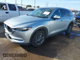 2020 Mazda CX-5 Touring with VIN JM3KFACM1L0789394, listed as a IAAI auction lot 41565887 with 73,730 mi miles. Bid and sale history available at carsss.com. Image 18.