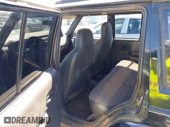 1999 Jeep Cherokee Sport with VIN 1J4FF68S6XL630724, listed as a IAAI auction lot 42237548 with 267,382 mi miles and . Bid and sale history available at DreamBid. Image 8.