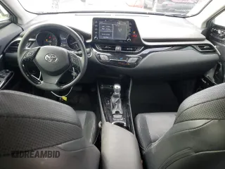 2021 Toyota C-HR LE z VIN JTNKHMBX0M1115552, wystawiony jako Copart lot #37291024 z przebiegiem 50 677 mil mil oraz Szkoda całkowita • Salvage title. Historia ofert i sprzedaży dostępna na DreamBid. Obrazek 8.