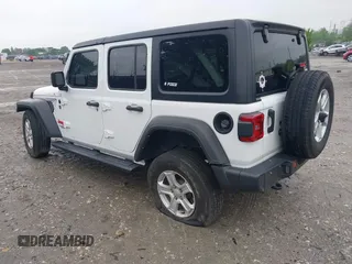 2021 Jeep Wrangler Unlimited Sport S with VIN 1C4HJXDG1MW850478, listed as a IAAI auction lot 42263715 with 31,284 mi miles and . Bid and sale history available at DreamBid. Image 3.