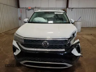 2023 Volkswagen Taos SE z VIN 3VVNX7B27PM309157, wystawiony jako Copart lot #51781625 z przebiegiem 23 355 mil mil oraz Szkoda całkowita • Salvage title. Historia ofert i sprzedaży dostępna na DreamBid. Obrazek 5.