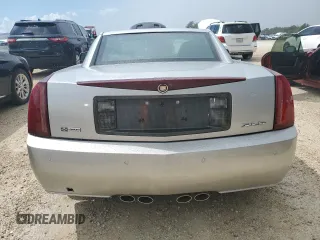2006 Cadillac XLR z VIN 1G6YV36A365601441, wystawiony jako Copart lot #73945994 z przebiegiem Nie podano mil oraz Szkody całkowita. Historia ofert i sprzedaży dostępna na DreamBid. Obrazek 6.