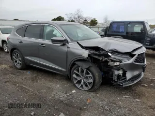 2022 Acura MDX w/Technology Package with VIN 5J8YE1H44NL052319, listed as a Copart auction lot 70911982 with 6,712 mi miles. Bid and sale history available at carsss.com. Image 4.