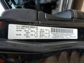 2014 Jeep Grand Cherokee Limited z VIN 1C4RJFBT6EC184557, wystawiony jako Copart lot #57657095 z przebiegiem 157 688 mil mil oraz Szkoda całkowita • Salvage title. Historia ofert i sprzedaży dostępna na DreamBid. Obrazek 13.