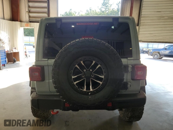2024 Jeep Wrangler Rubicon X with VIN 1C4RJXFG5RW287542, listed as a Copart auction lot 72682924 with 5,792 mi miles and Salvage title. Bid and sale history available at DreamBid. Image 6.