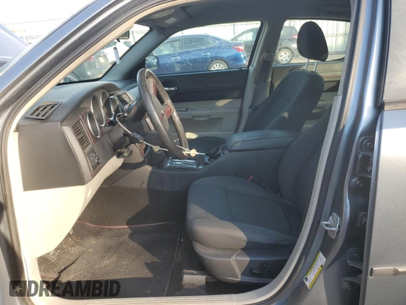 2007 Dodge Charger SXT z VIN 2B3KK43G57H823145, wystawiony jako Copart lot #74926923 z przebiegiem 193 591 mil mil oraz Szkoda całkowita • Salvage title. Historia ofert i sprzedaży dostępna na DreamBid. Obrazek 13.