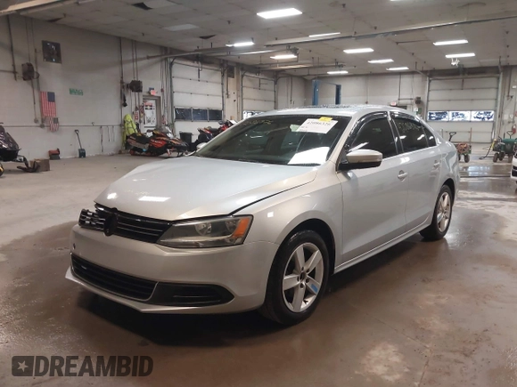 2014 Volkswagen Jetta TDI w/Premium with VIN 3VW3L7AJ6EM379401, listed as a IAAI auction lot 42086326 with 89,870 mi miles and . Bid and sale history available at DreamBid. Image 2.
