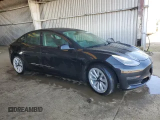 2022 Tesla Model 3 with VIN 5YJ3E1EA2NF190124, listed as a Copart auction lot 48759565 with 137,726 mi miles and Clean Title. Bid and sale history available at carsss.com. Image 4.
